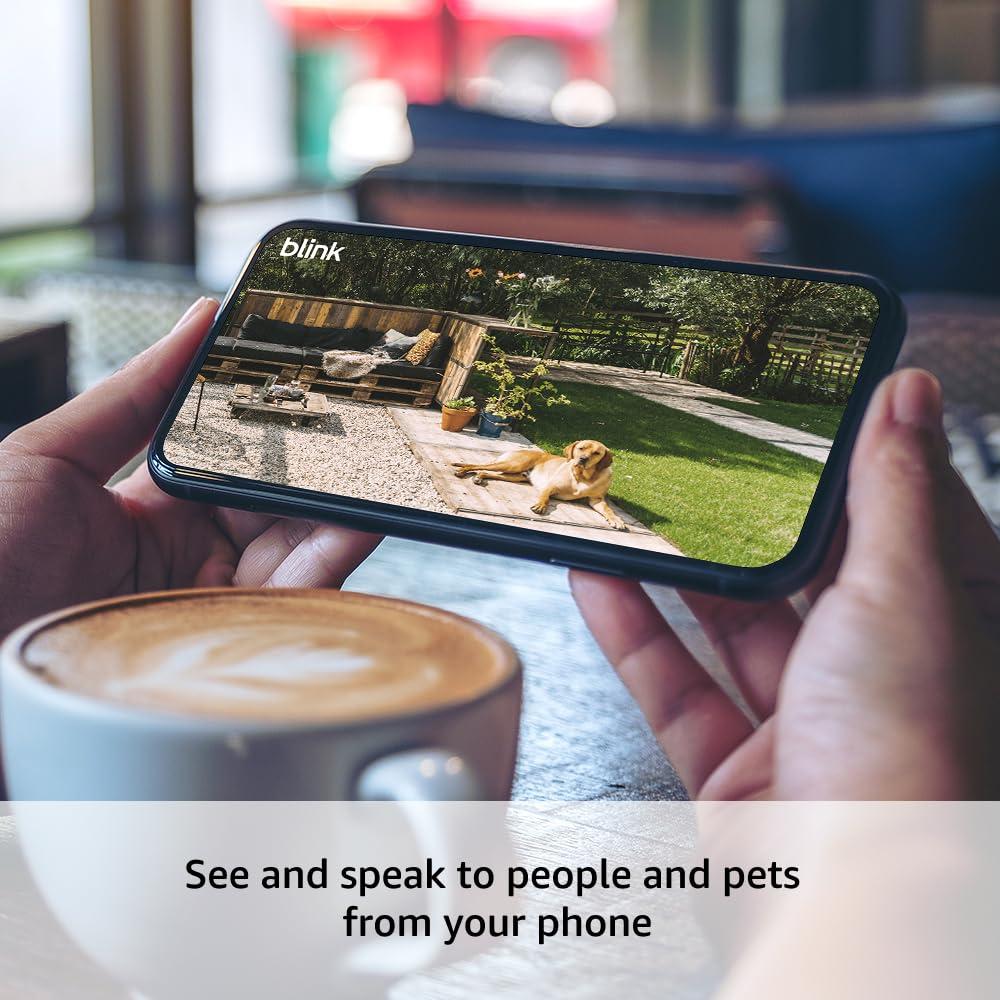 imageBlink Outdoor 4 newest model  Wireless smart security camera twoyear battery life twoway talk Sync Module Core included 2 camera system with 1Year Plus PlanSave with Subscription